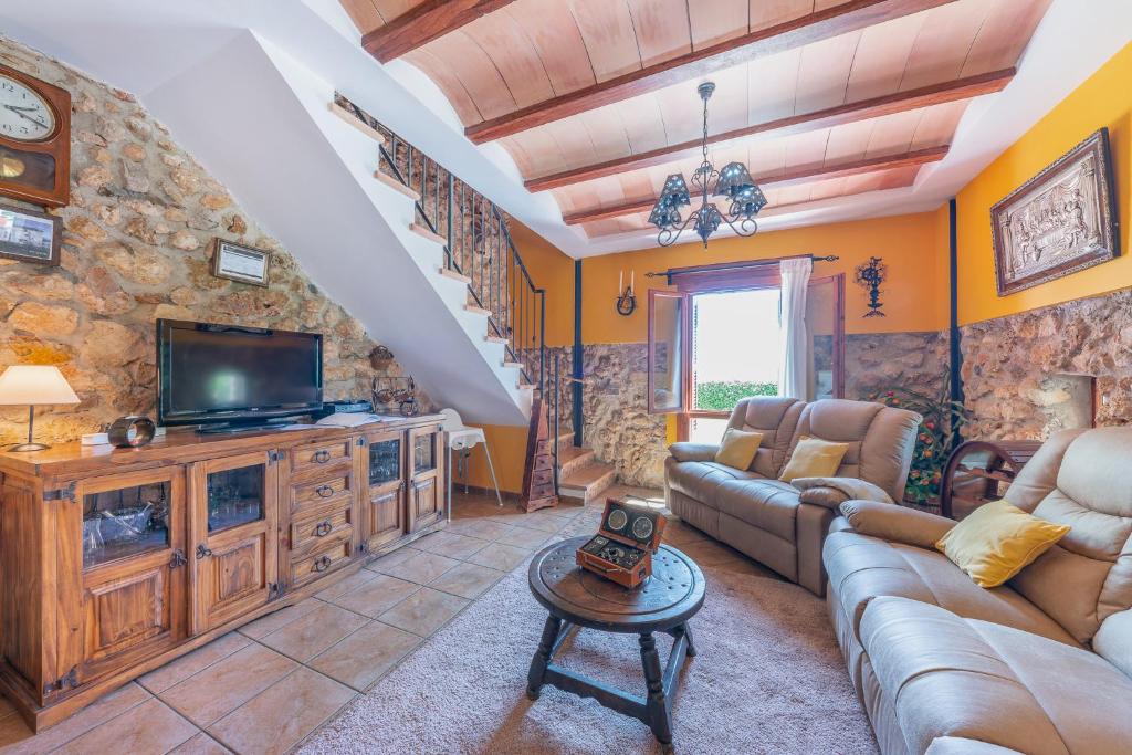 A television and/or entertainment centre at Finca Can Diego