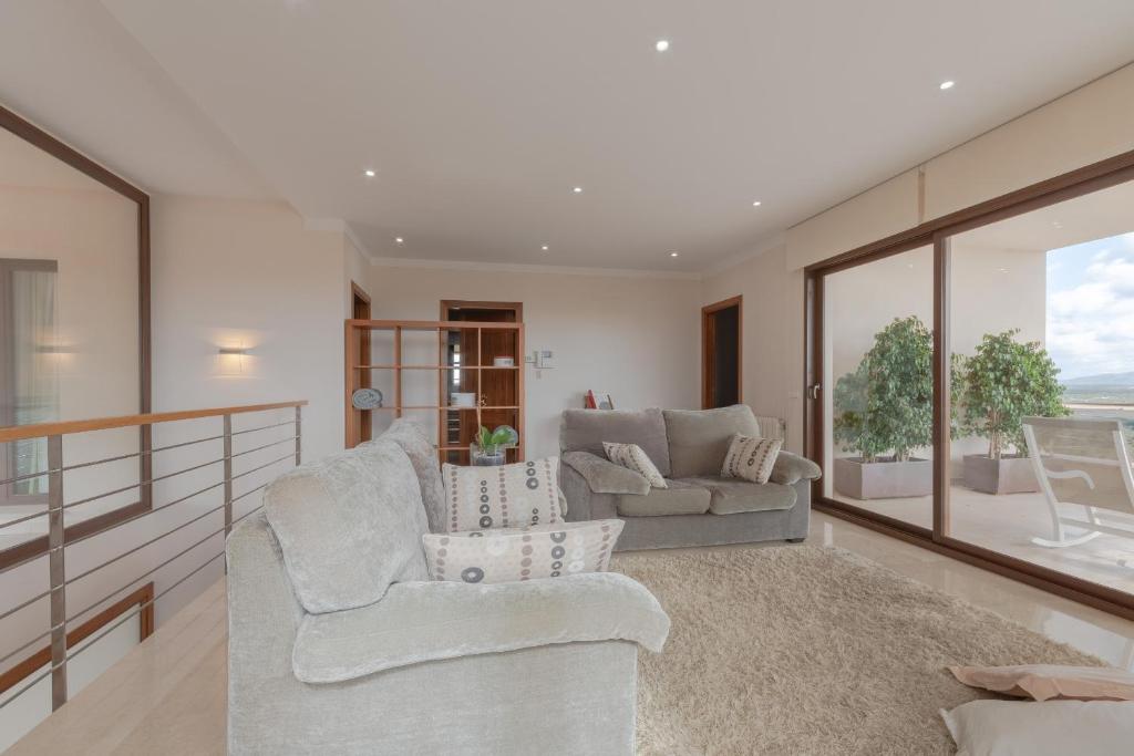 A seating area at Villa Es Sequer