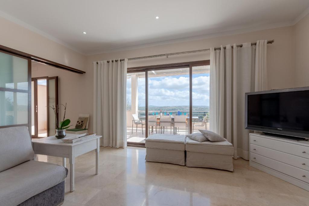 A television and/or entertainment centre at Villa Es Sequer