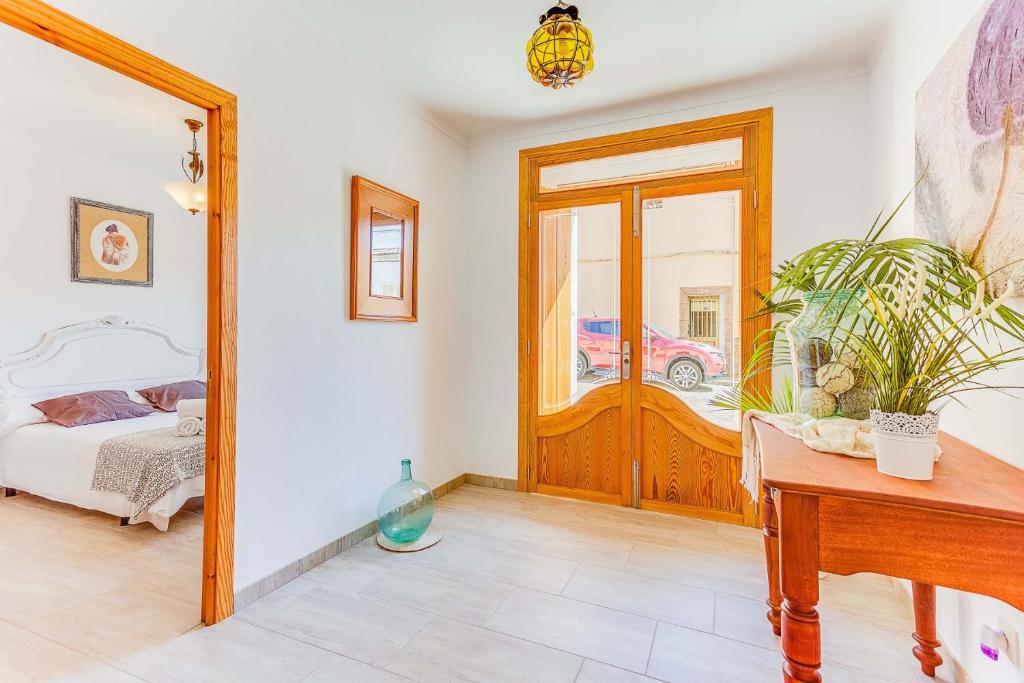 A bed or beds in a room at Cantino House