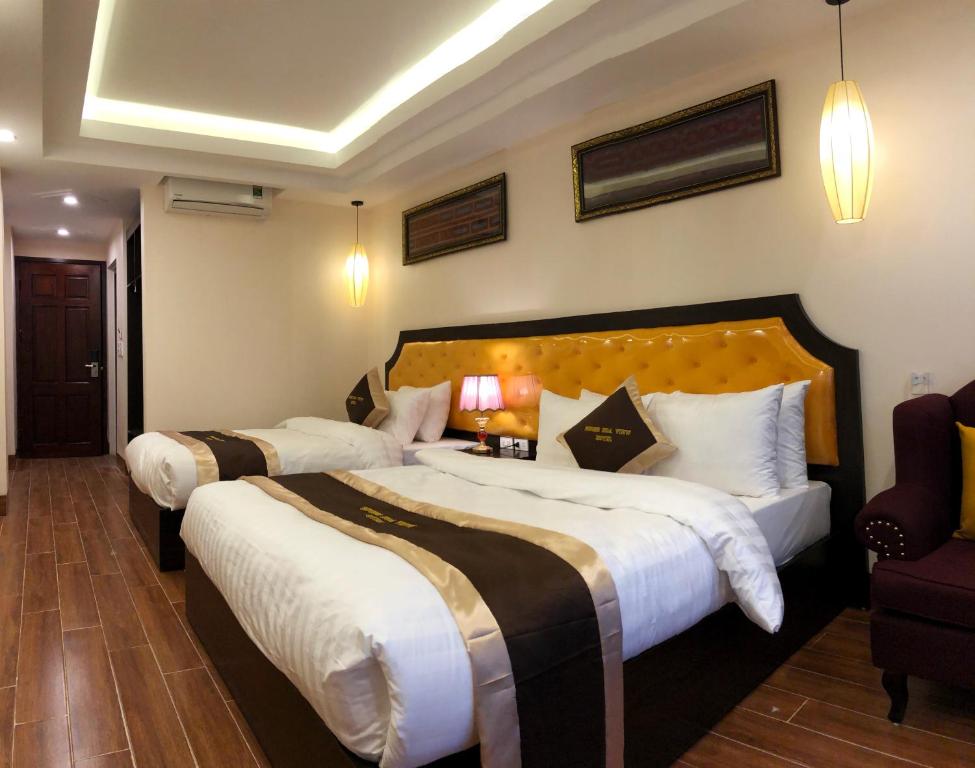 Postel nebo postele na pokoji v ubytování Sapa Odyssey Hostel