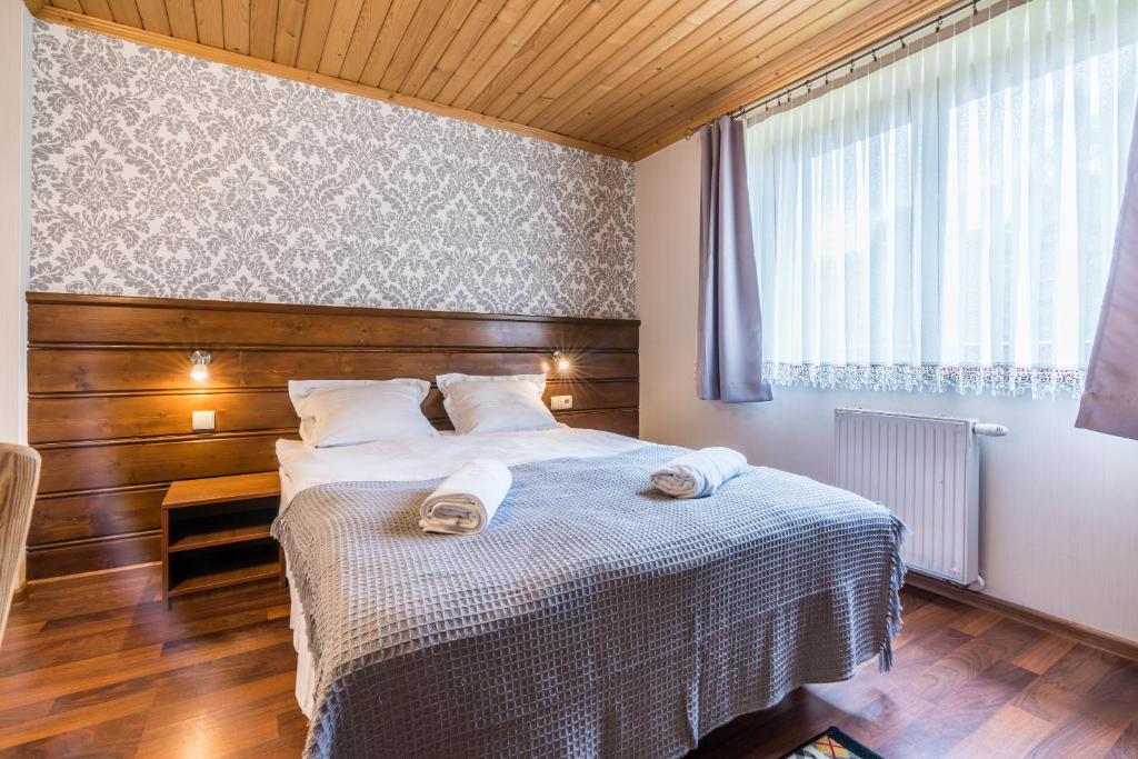 Posteľ alebo postele v izbe v ubytovaní Willa Margo