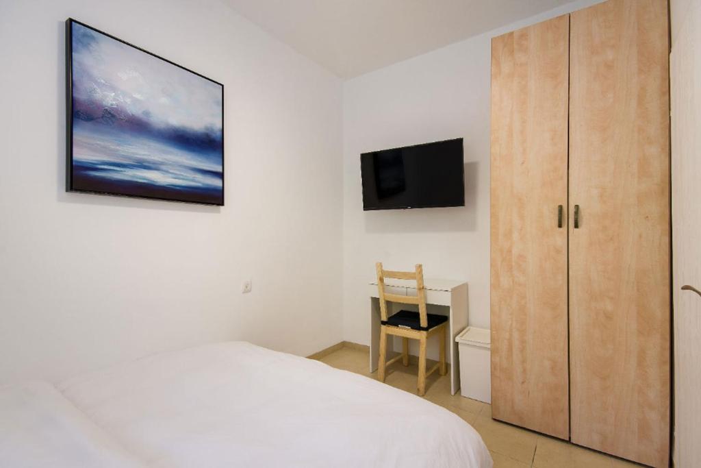 TV a/nebo společenská místnost v ubytování Yagen boutique apartments