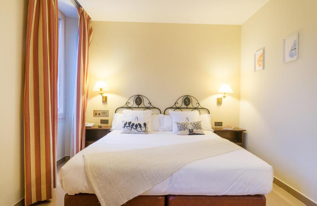 Postel nebo postele na pokoji v ubytování Hotel Andria