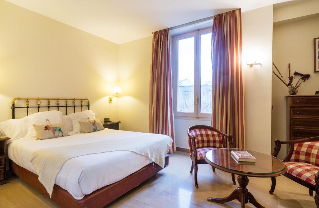 Postel nebo postele na pokoji v ubytování Hotel Andria