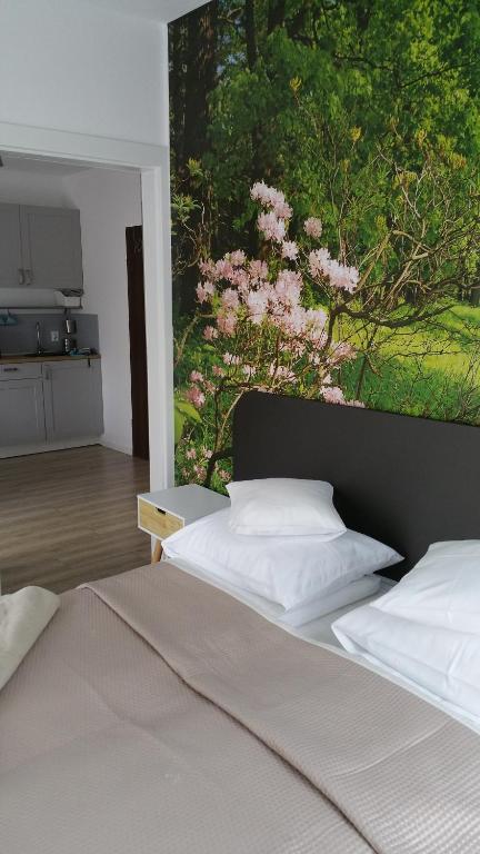 Łóżko lub łóżka w pokoju w obiekcie Dom Przy Plaży