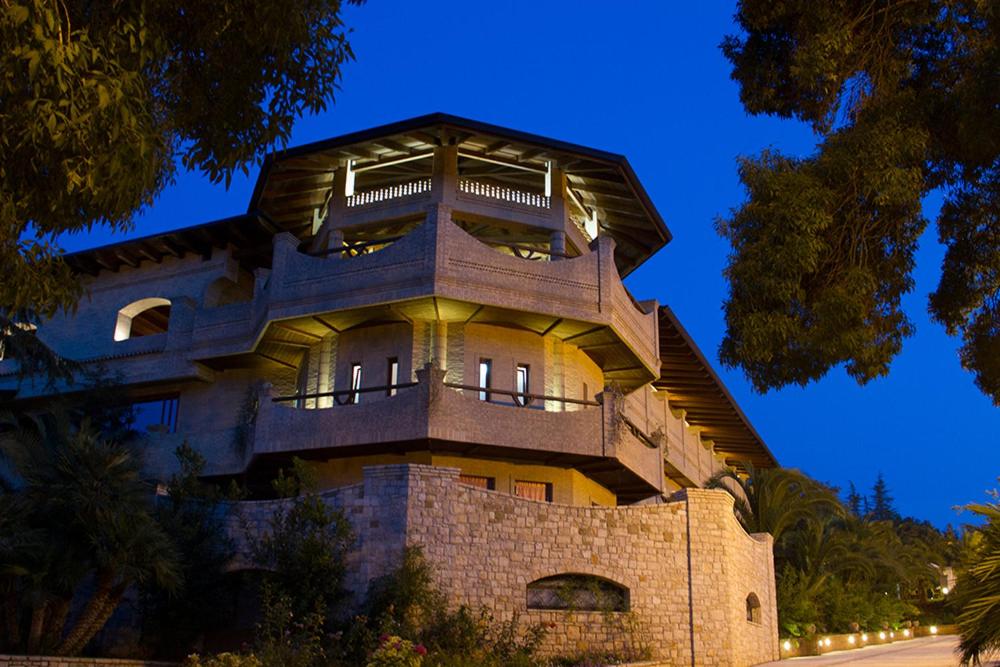 a large building with a tower on top of it at Il Portico Luxury B&B in Cassano delle Murge