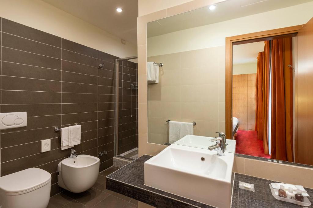 Koupelna v ubytování Accademia Hotel