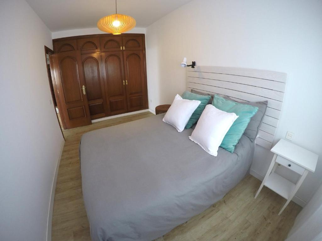 A bed or beds in a room at Casa Capricho