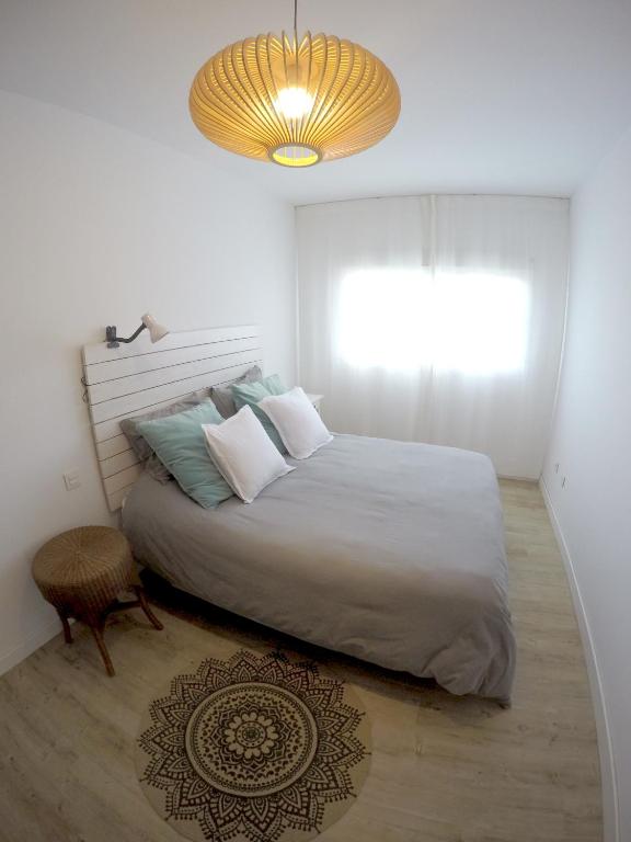 A bed or beds in a room at Casa Capricho