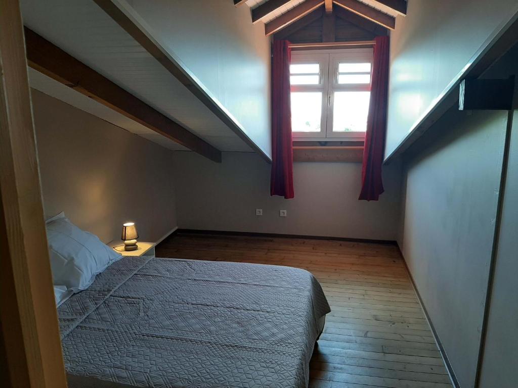 Postel nebo postele na pokoji v ubytování Les Monts Arlésien
