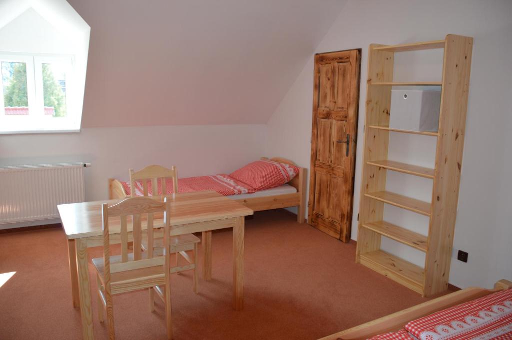 Postel nebo postele na pokoji v ubytování Penzion U podkováře