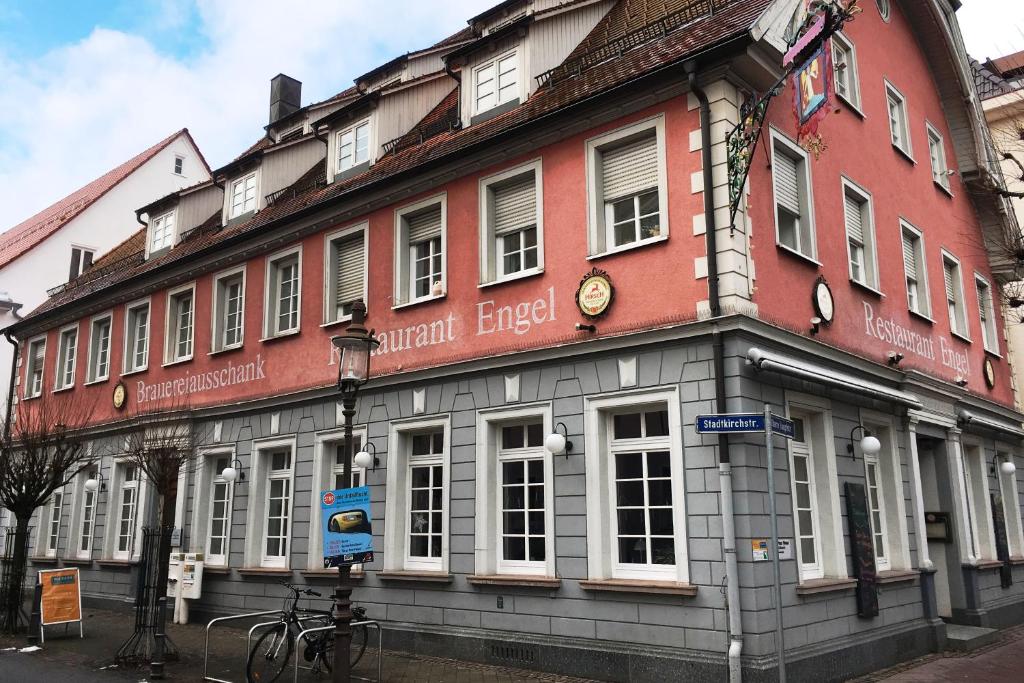 a building with a bike parked in front of it at Restaurant Engel am Marktplatz Tuttlingen in Tuttlingen