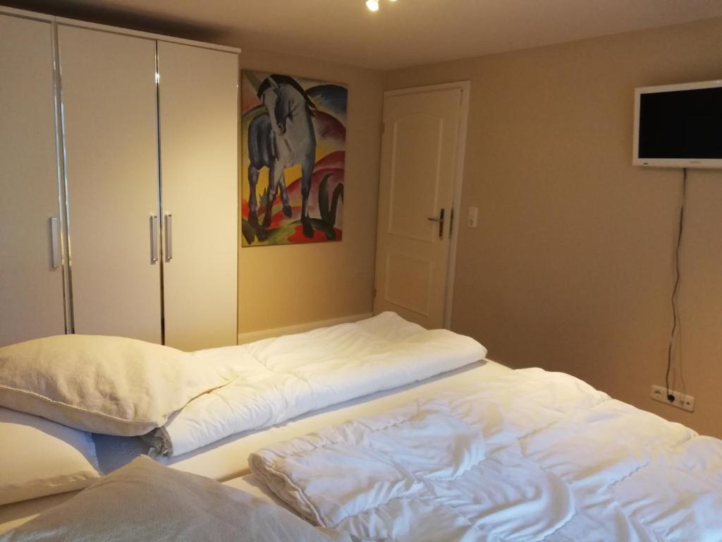 Postel nebo postele na pokoji v ubytování Seepferdchen