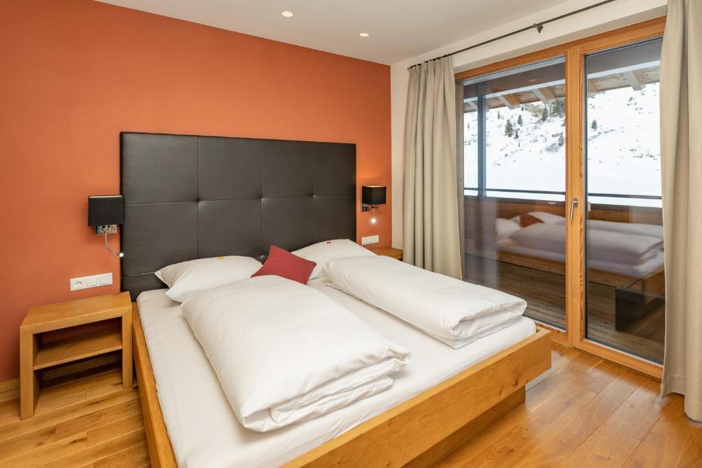 Postel nebo postele na pokoji v ubytování Alphus Appartements