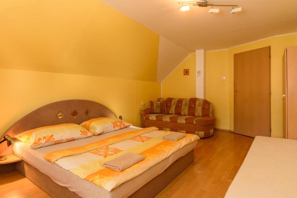 Postel nebo postele na pokoji v ubytování Apartman Elegant