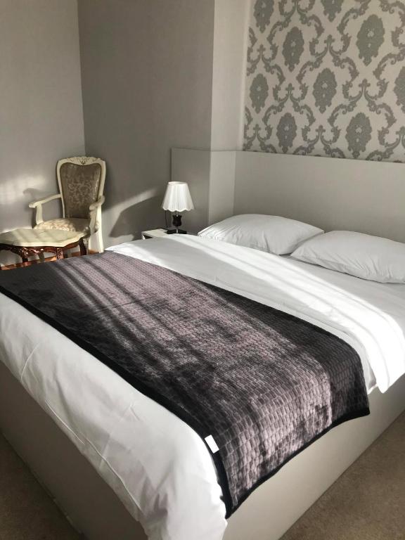 Postel nebo postele na pokoji v ubytování Hotel Eurica