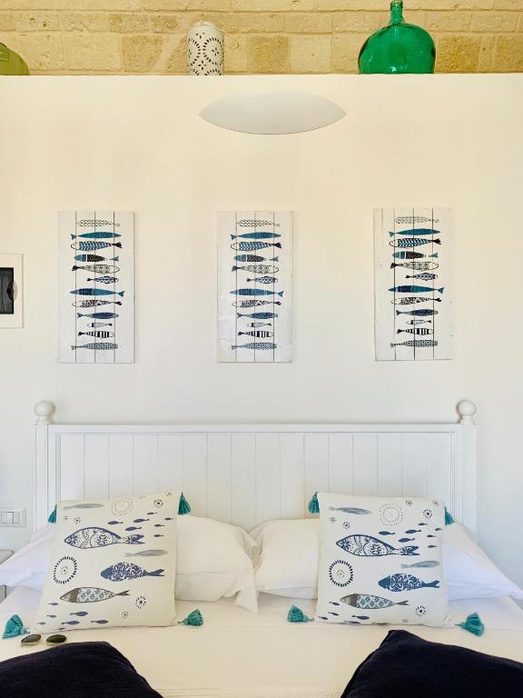 Postel nebo postele na pokoji v ubytování POSEA - Polignano Sea Suites