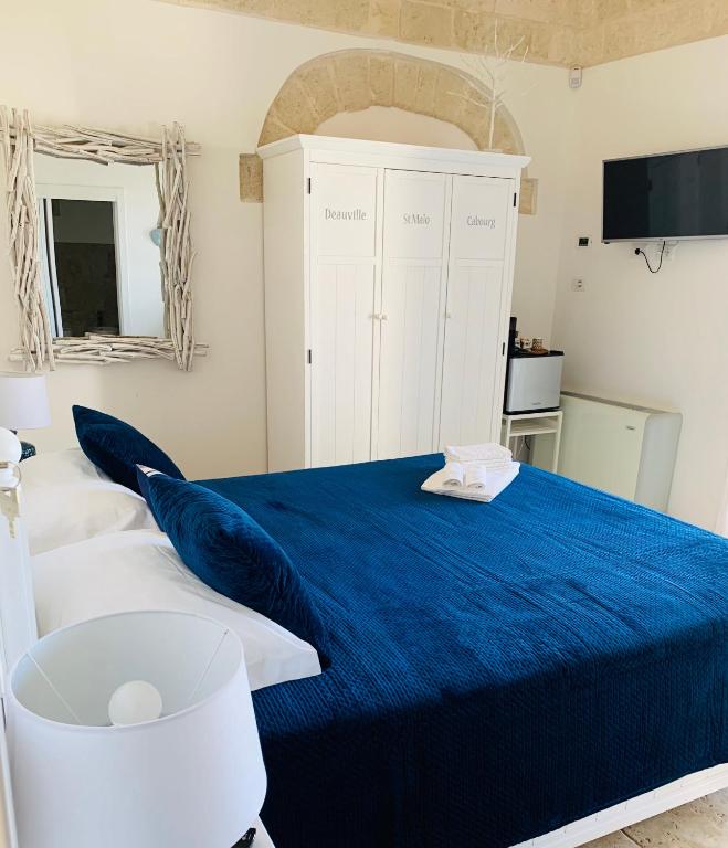 Postel nebo postele na pokoji v ubytování POSEA - Polignano Sea Suites