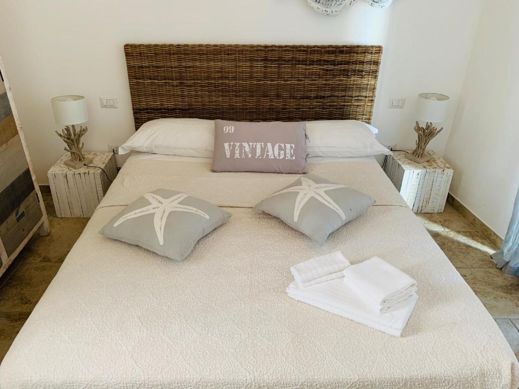 Postel nebo postele na pokoji v ubytování POSEA - Polignano Sea Suites