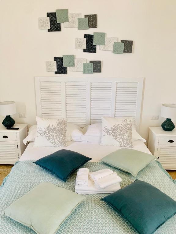 Postel nebo postele na pokoji v ubytování POSEA - Polignano Sea Suites