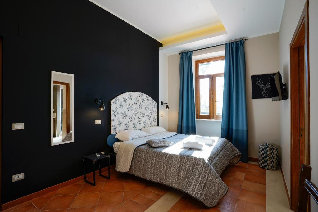 Łóżko lub łóżka w pokoju w obiekcie Cascina San Michele