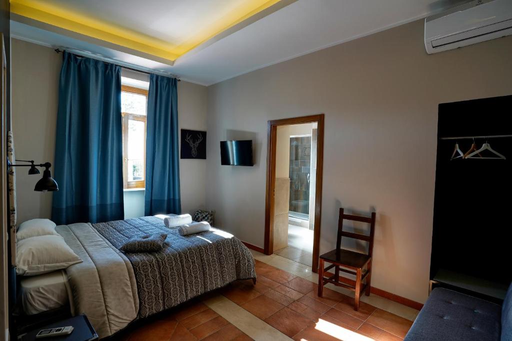 Łóżko lub łóżka w pokoju w obiekcie Cascina San Michele