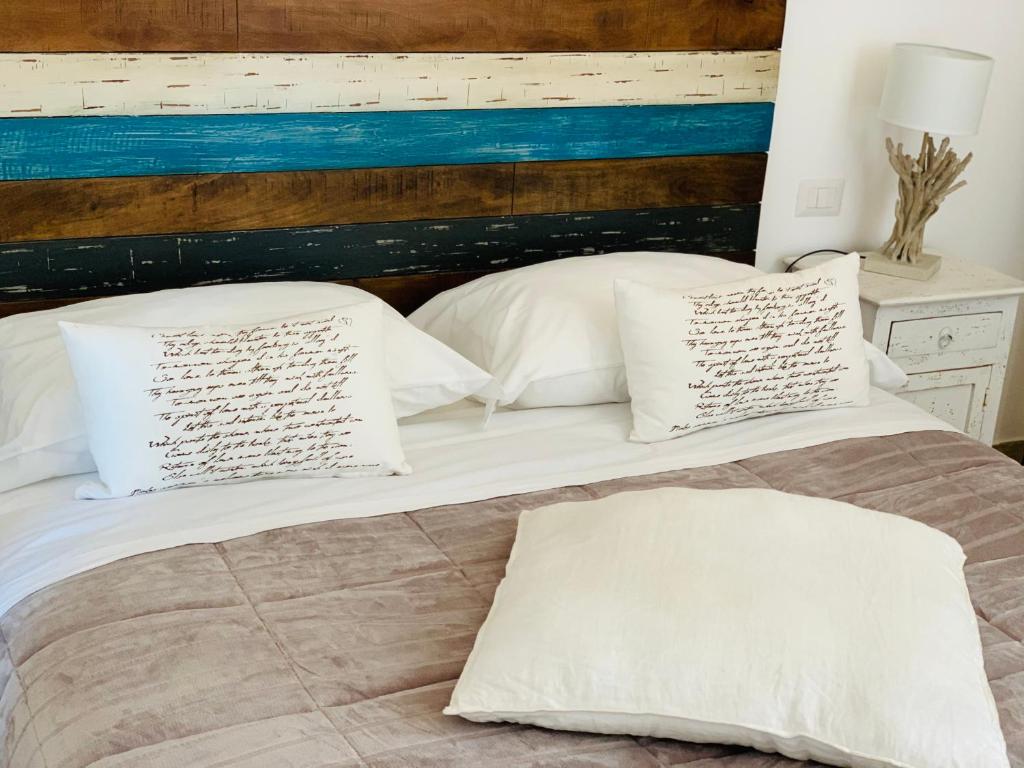 Postel nebo postele na pokoji v ubytování POSEA - Polignano Sea Suites
