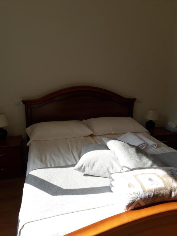 A bed or beds in a room at Il Borgo dei Molini
