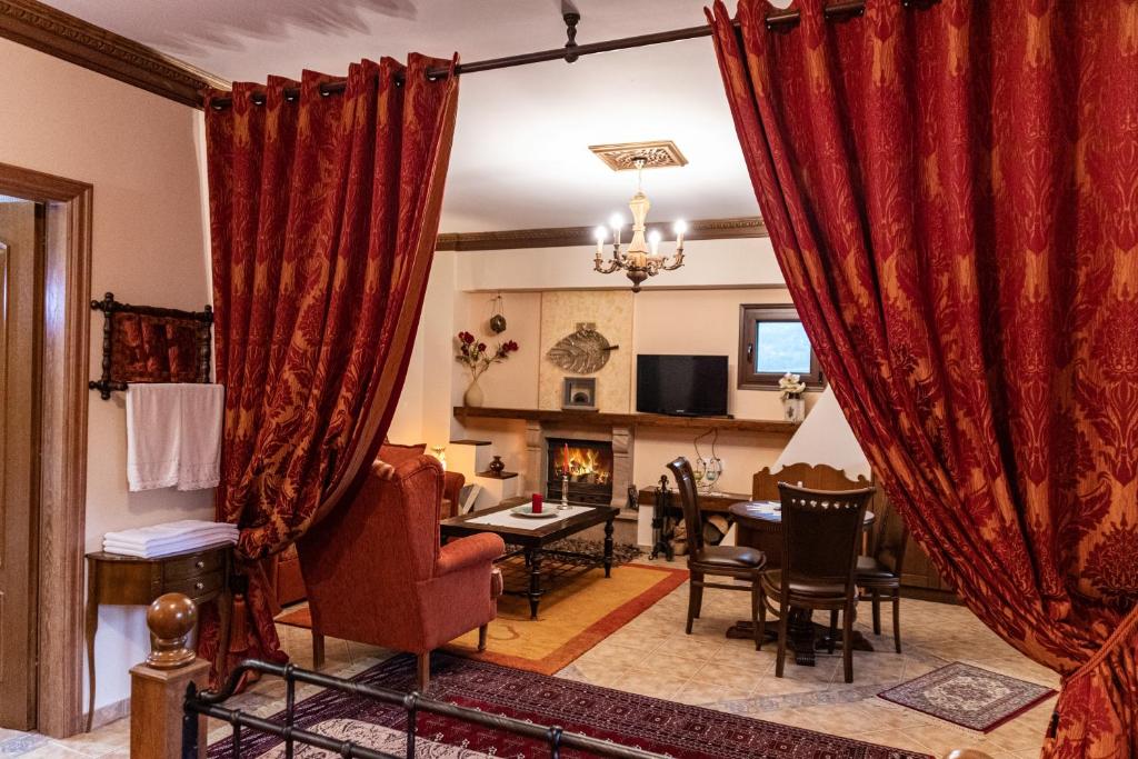 TV a/nebo společenská místnost v ubytování Margit Suites Hotel