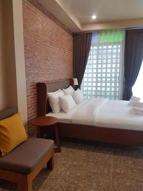 Postel nebo postele na pokoji v ubytování Mon-Dee minihotel