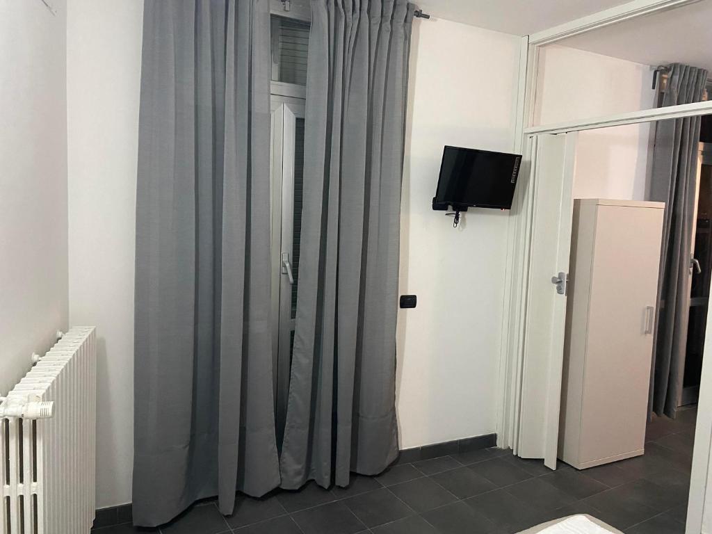 A television and/or entertainment centre at BICOCCA APPARTAMENTI