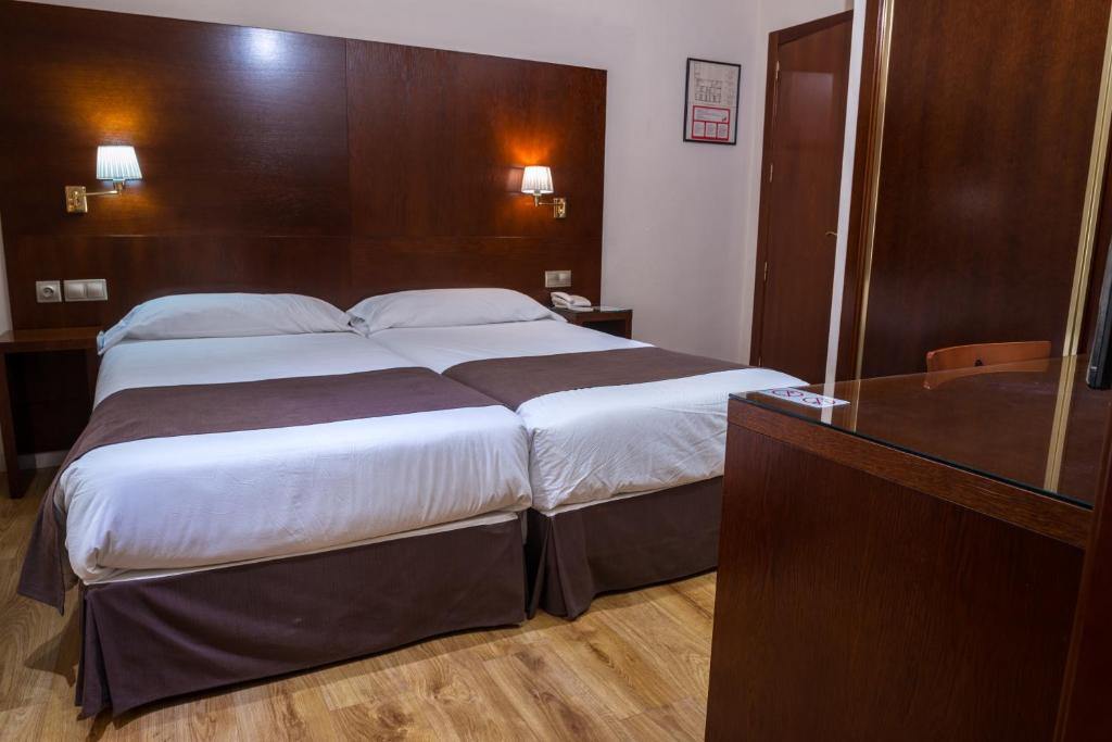 Een bed of bedden in een kamer bij Ramon Berenguer IV