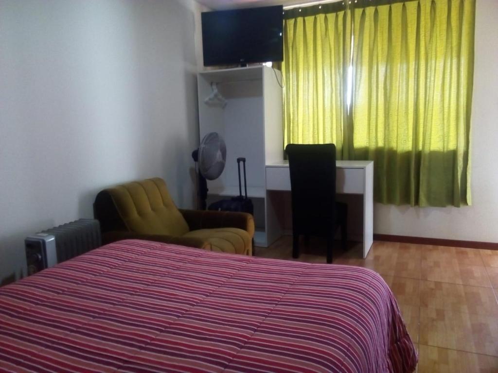 Postel nebo postele na pokoji v ubytování Misti Hostel B&B