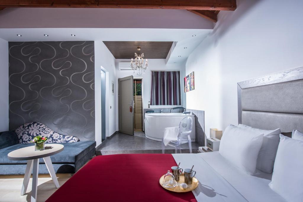 Posteľ alebo postele v izbe v ubytovaní Happy Cretan Suites