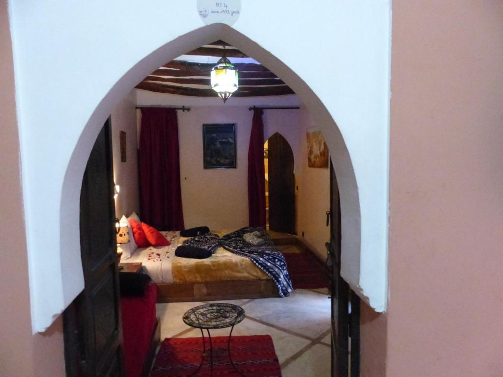 Postel nebo postele na pokoji v ubytování Riad Jakoura