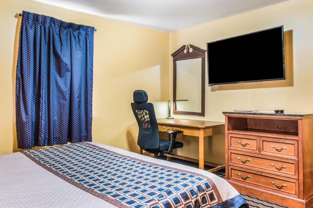 TV a/nebo společenská místnost v ubytování Cottage Inn - Grantville