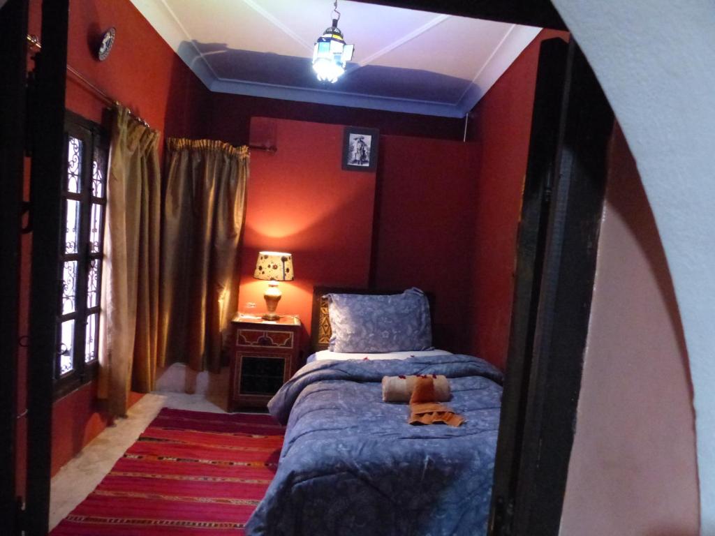 Postel nebo postele na pokoji v ubytování Riad Jakoura