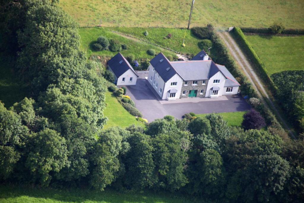 an aerial view of a large house in a field at PK Lodge B&B in Skibbereen