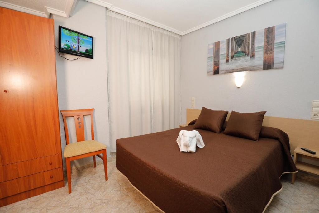 TV a/nebo společenská místnost v ubytování Hostal Conde David