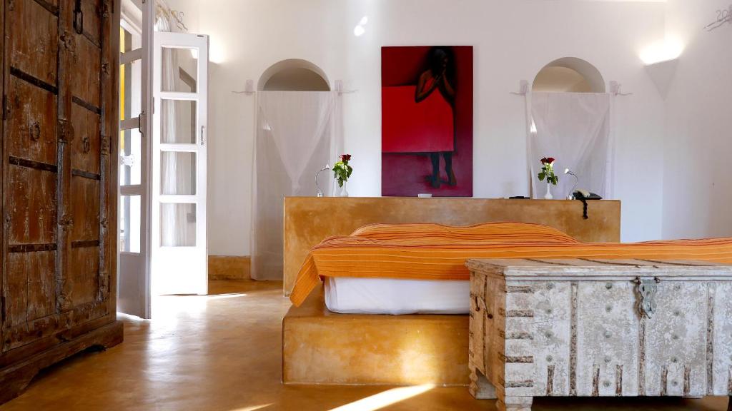 Giường trong phòng chung tại Sur La Mer