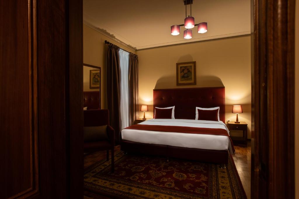 Postel nebo postele na pokoji v ubytování Pao de Acucar Hotel