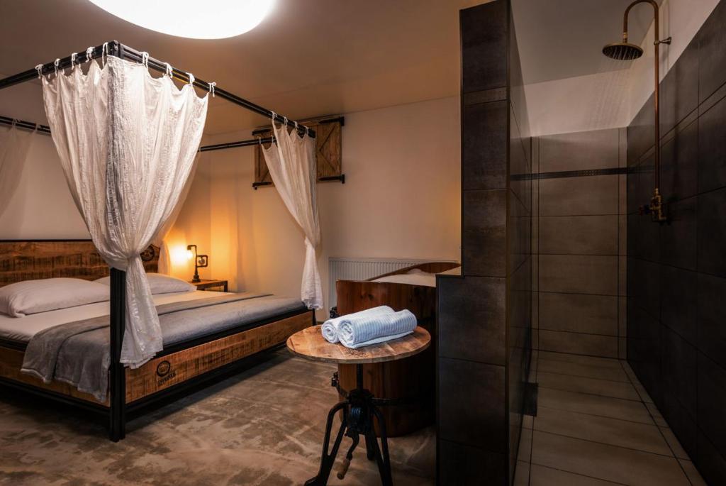 Postel nebo postele na pokoji v ubytování Maravar - Pivný Wellness Adults Only