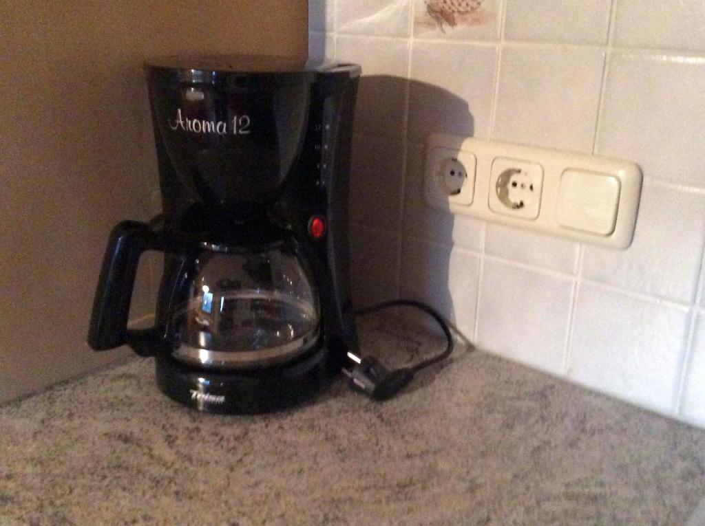 Príslušenstvo na prípravu kávy alebo čaju v ubytovaní Ferienwohnung Rahm