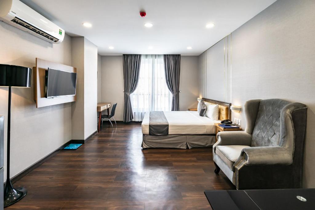 TV a/nebo společenská místnost v ubytování Emerald Central