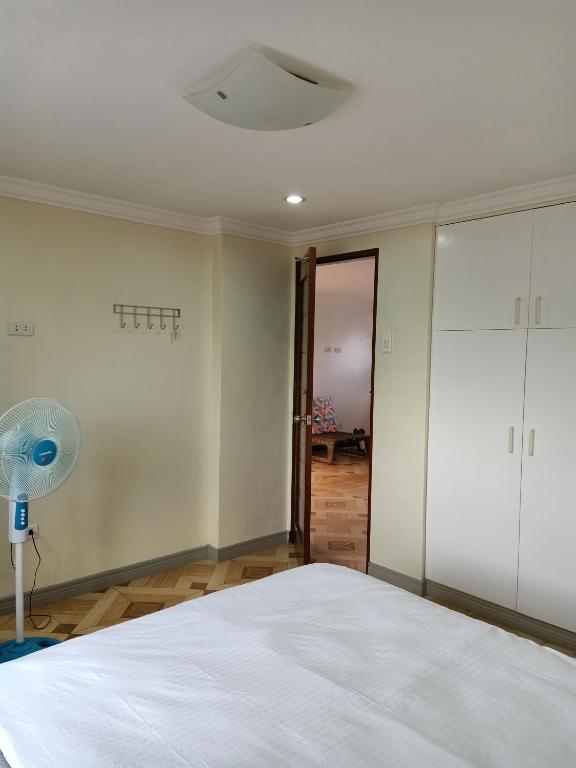Postel nebo postele na pokoji v ubytování AJ's Haven Homestay