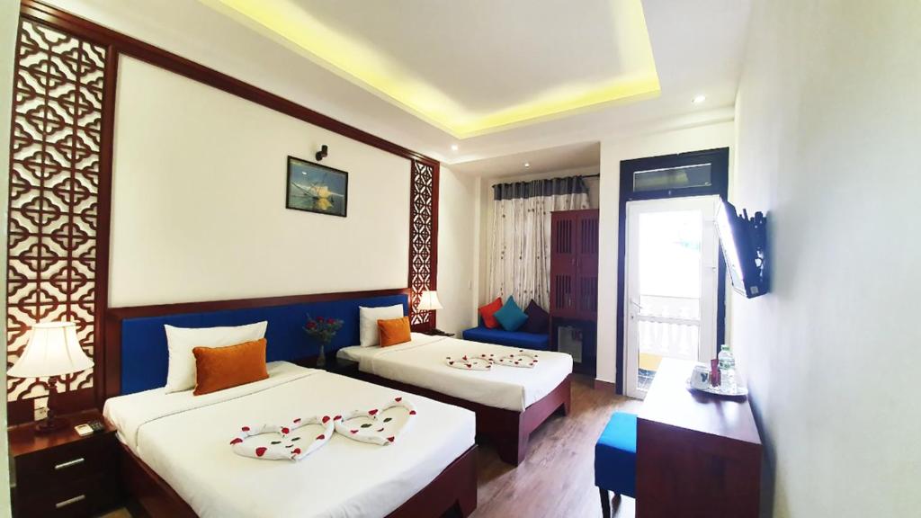 Hoi An Hai Au Boutique Hotel - Deluxe Tweepersoonskamer Met 2 Aparte Bedden
