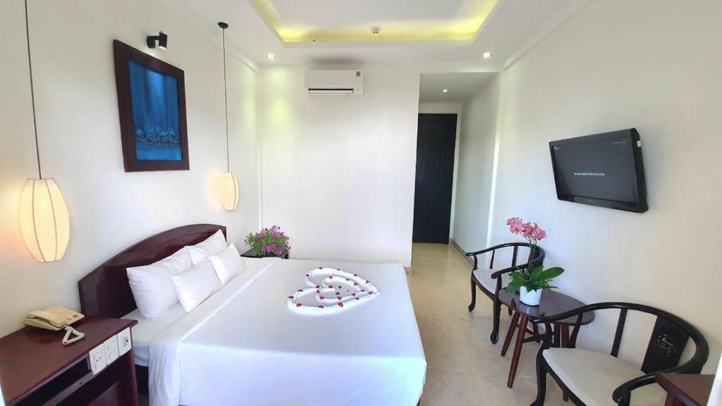 TV a/nebo společenská místnost v ubytování Hoi An Hai Au Boutique Hotel