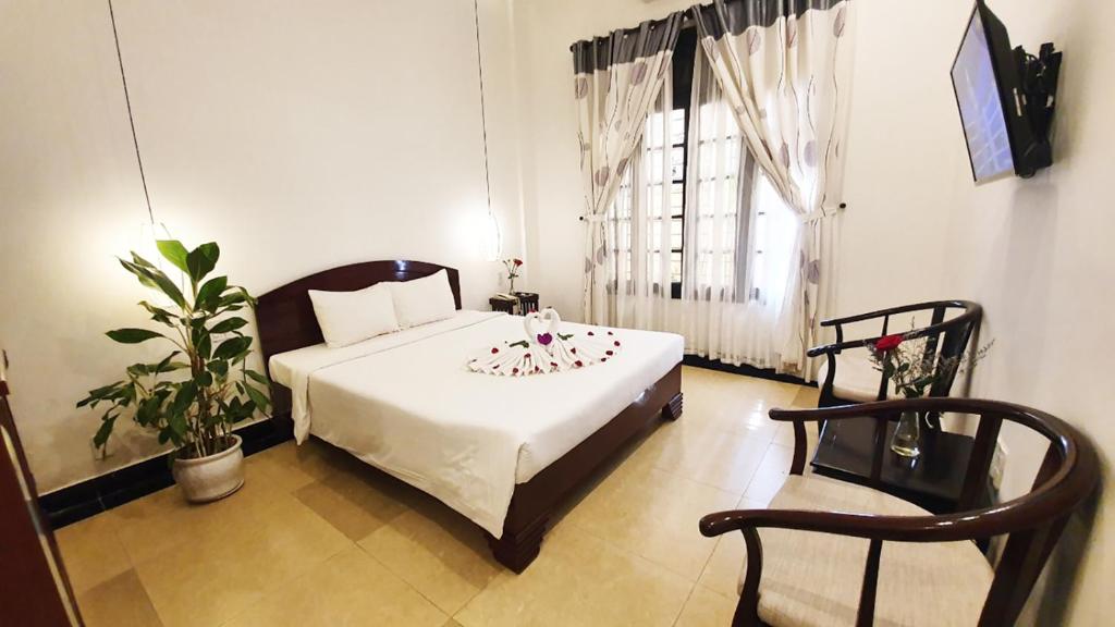 TV a/nebo společenská místnost v ubytování Hoi An Hai Au Boutique Hotel