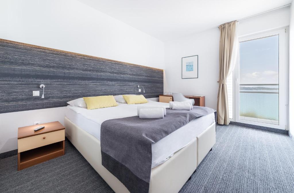 Posteľ alebo postele v izbe v ubytovaní Hotel Punta